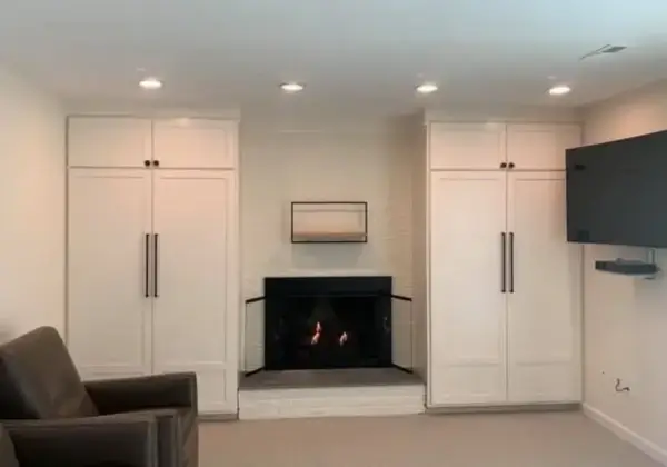 Cozy living room with fireplace and cabinets