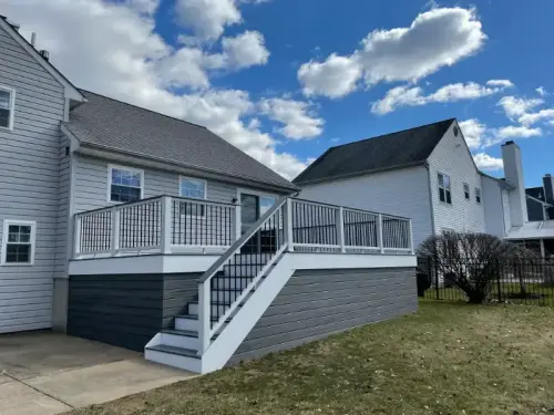 Modern house with elevated deck and stairs