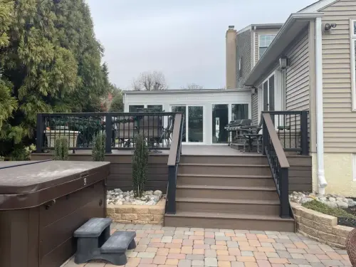 Modern patio with deck and hot tub