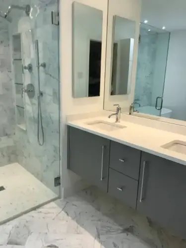 Modern bathroom with shower and double vanity