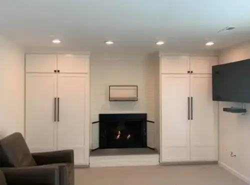 Modern living room with fireplace and cabinets