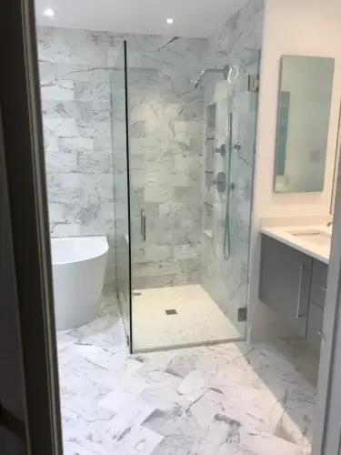 Modern bathroom with marble tile shower