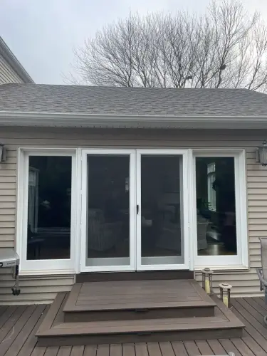 Sliding glass door on wooden deck